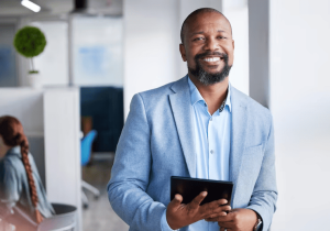 happy black man portrait tablet meeting leadership management networking office face african businessman smile with technology online research communication workplace 590464 302457